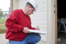 Man working on a garage door